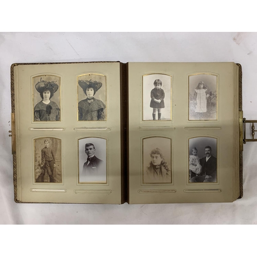 186 - A VICTORIAN LEATHERBOUND PHOTO ALBUM CONTAINING PHOTO'S