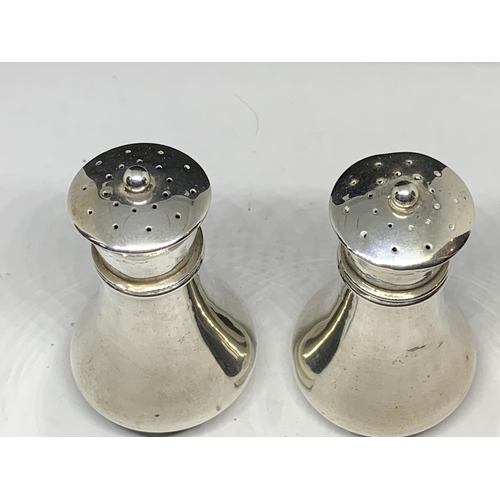 31 - TWO HALLAMRKED BIRMINGHAM SILVER PEPPER POTS GROSS WEIGHT 47 GRAMS