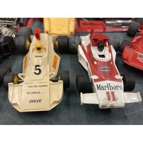 312 - A LARGE ASSORTMENT OF MODEL RACING CARS TO INCLUDE A NUMBER OF VINTAGE AND RETRO SCALETRIX CARS, A B... 