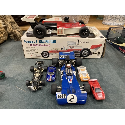 312 - A LARGE ASSORTMENT OF MODEL RACING CARS TO INCLUDE A NUMBER OF VINTAGE AND RETRO SCALETRIX CARS, A B... 