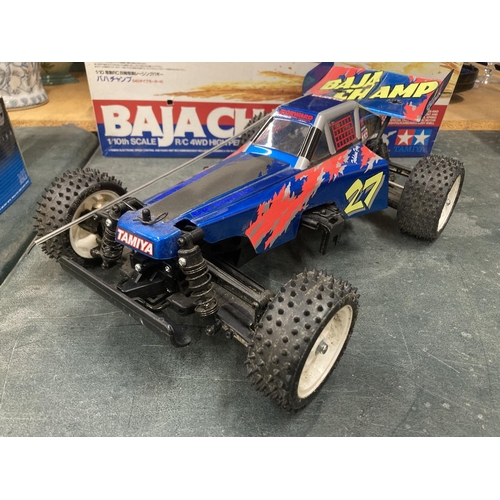 314 - A TAMIYA BAJA CHAMP 1/10TH SCALE R/C 4WD HIGH PERFORMANCE OFF ROAD RACER (NO CONTROLLER PRESENT)