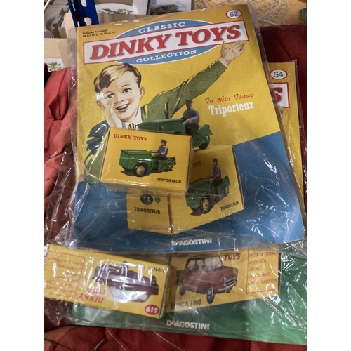 319 - AN ASSORTMENT OF VINTAGE TOYS AND GAMES TO INCLUDE A RUSSIAN DOLL, DINKY VEHICLES, HAND PUPPETS AND ... 