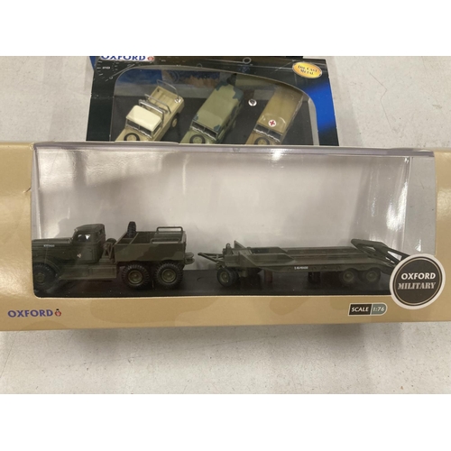 397 - FOUR BOXED OXFORD MILITARY SERIES VEHICLES TO INCLUDE TWO WITH THREE LAND ROVERS IN EACH