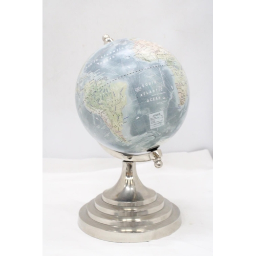 213 - A GLOBE ON A CIRCULAR PEDESTAL BASE, HEIGHT 34CM