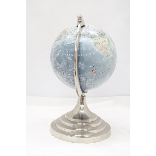 213 - A GLOBE ON A CIRCULAR PEDESTAL BASE, HEIGHT 34CM