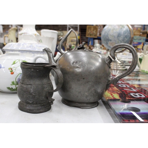 217 - A GEORGIAN PEWTER TEAPOT AND A 14TH CENTURY PEWTER MUG