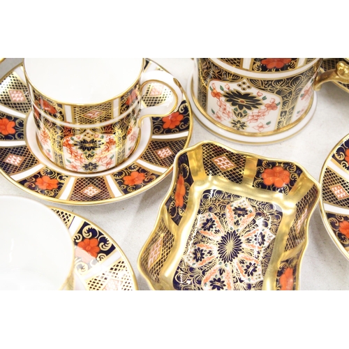 12 - A QUANTITY OF ROYAL CROWN DERBY TO INCLUDE A LOVING CUP , COFFEE CANS AND SAUCERS, TEACUPS AND SAUCE... 