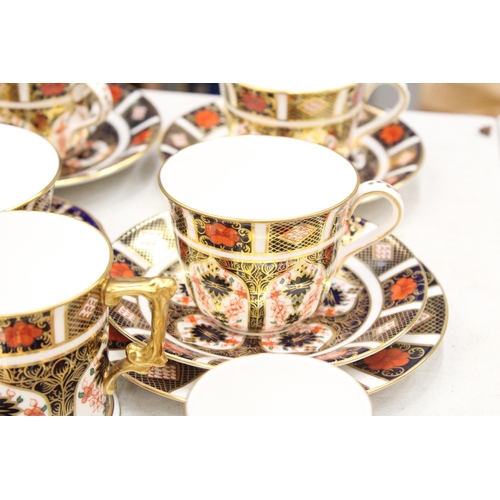 12 - A QUANTITY OF ROYAL CROWN DERBY TO INCLUDE A LOVING CUP , COFFEE CANS AND SAUCERS, TEACUPS AND SAUCE... 