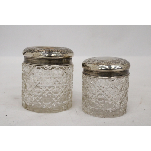 13 - A STERLING SILVER TOP HAIR PIN JAR TOGETHER WITH A SILVER TOPPED COCKTAIL STICK HOLDER