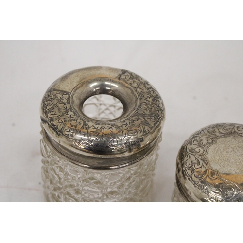 13 - A STERLING SILVER TOP HAIR PIN JAR TOGETHER WITH A SILVER TOPPED COCKTAIL STICK HOLDER