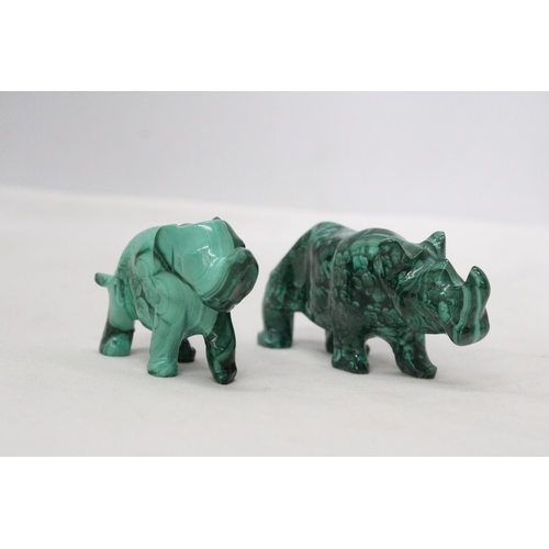 26 - A MALACHITE PRECIOUS STONE CARVING OF A RHINO AND AN ELEPHANT