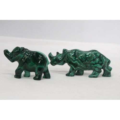 26 - A MALACHITE PRECIOUS STONE CARVING OF A RHINO AND AN ELEPHANT