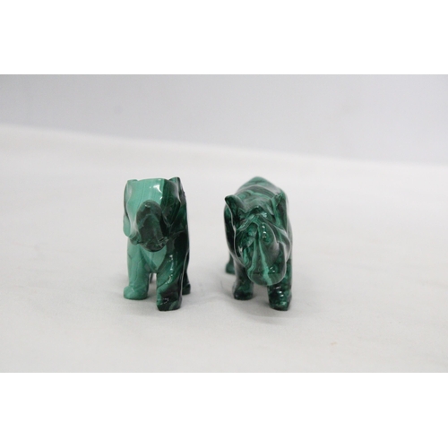 26 - A MALACHITE PRECIOUS STONE CARVING OF A RHINO AND AN ELEPHANT