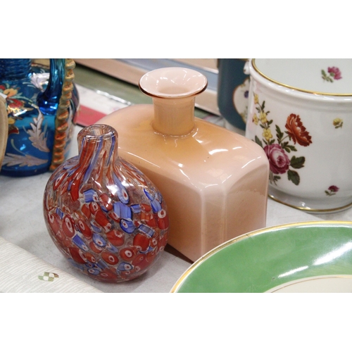 193 - A PEACH GLASS BOTTLE VASE AND A MILLIFIORE VASE - POSSIBLY MURANO