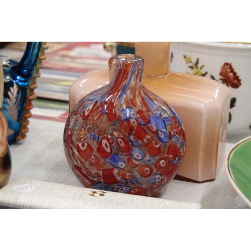 193 - A PEACH GLASS BOTTLE VASE AND A MILLIFIORE VASE - POSSIBLY MURANO