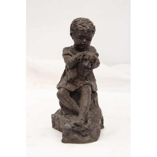 238 - A VINTAGE RESIN SCULPTURE OF A GIRL WITH DOG - APPROXIMATELY 18CM HIGH