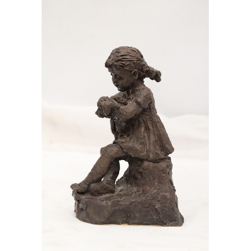 238 - A VINTAGE RESIN SCULPTURE OF A GIRL WITH DOG - APPROXIMATELY 18CM HIGH