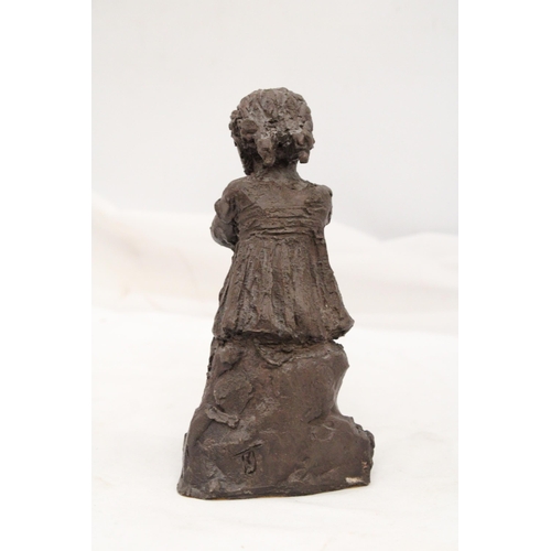 238 - A VINTAGE RESIN SCULPTURE OF A GIRL WITH DOG - APPROXIMATELY 18CM HIGH