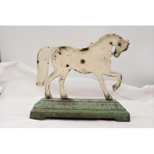 241 - A VICTORIAN CAST IRON HORSE DOOR STOP ON GREEN BASE - APPROXIMATELY 23CM X 23CM