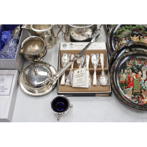 250A - A MIXED LOT OF SILVER PLATE TO INCLUDE A TEAPOT, JUGS, CANDELABRA ETC