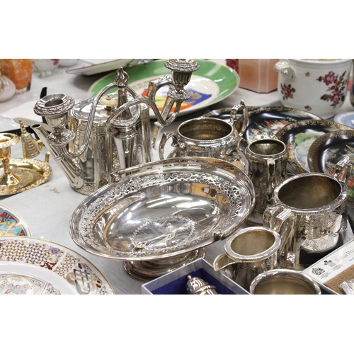 250A - A MIXED LOT OF SILVER PLATE TO INCLUDE A TEAPOT, JUGS, CANDELABRA ETC