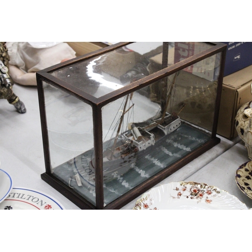 256 - A VICTORIAN SHIPWRECK, SHIP IN A GLASS CASE, 'THE BRADFORD', LENGTH 37CM, HEIGHT 25CM, DEPTH 18CM