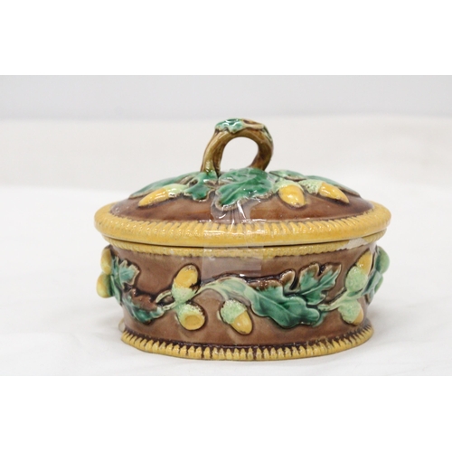 276 - A MAJOLICA, OVAL, LIDDED POT, WITH OAK LEAF AND ACORN DECORATION