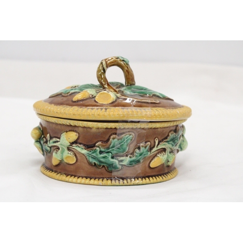 276 - A MAJOLICA, OVAL, LIDDED POT, WITH OAK LEAF AND ACORN DECORATION