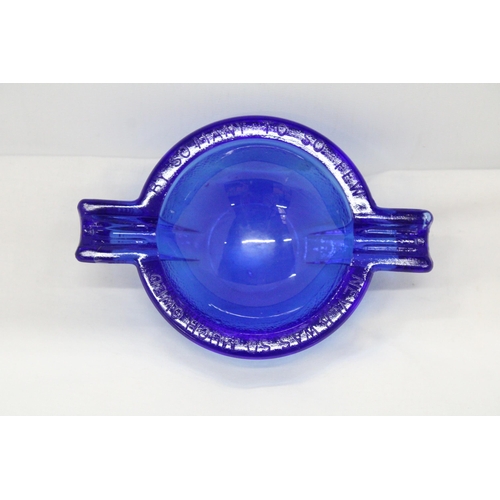 278 - A WW2, CHUNKY BLUE GLASS ASHTRAY, EMBOSSED WITH THE WORDS, 'NEVER WAS SO MUCH, OWED BY SO MANY, TO S... 