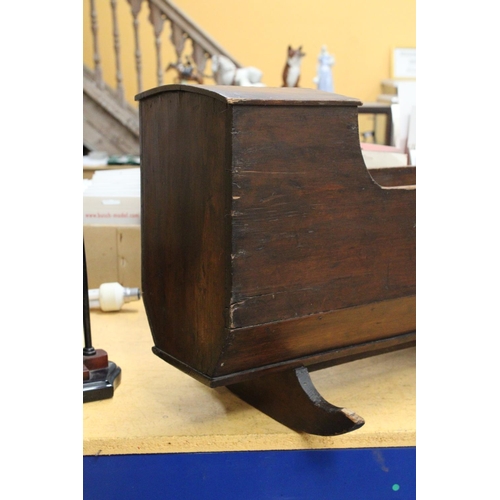 65 - A VICTORIAN WOODEN ROCKING CRADLE