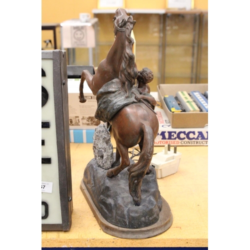 68 - A HEAVY FRENCH METAL HORSE AND MAN ON WOODEN BASE 