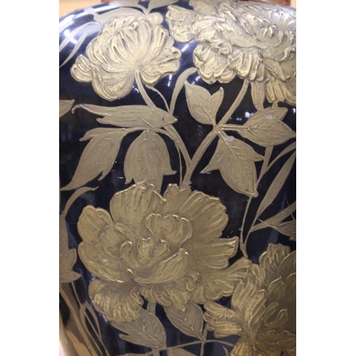 79 - A LARGE VASE WITH GOLD EMBOSSED FLORALS PAINTED IN 22 CT GOLD