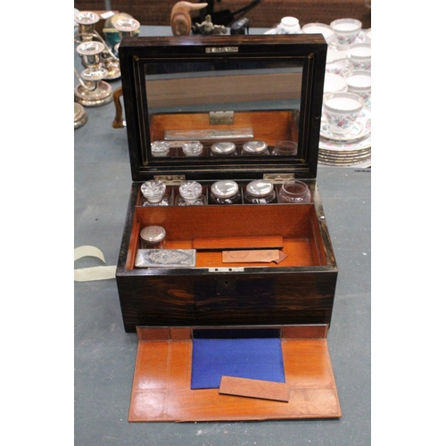 85 - A VINTAGE MAHOGANY CASED WRITING BOX WITH A SECRET DRAWER TO INCLUDE INKWELLS, AND SILVER PLATED LID... 