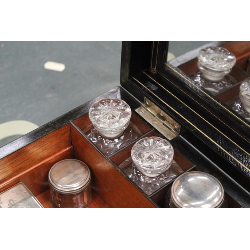 85 - A VINTAGE MAHOGANY CASED WRITING BOX WITH A SECRET DRAWER TO INCLUDE INKWELLS, AND SILVER PLATED LID... 