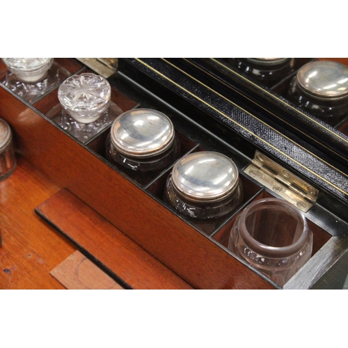 85 - A VINTAGE MAHOGANY CASED WRITING BOX WITH A SECRET DRAWER TO INCLUDE INKWELLS, AND SILVER PLATED LID... 