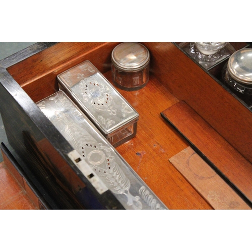 85 - A VINTAGE MAHOGANY CASED WRITING BOX WITH A SECRET DRAWER TO INCLUDE INKWELLS, AND SILVER PLATED LID... 