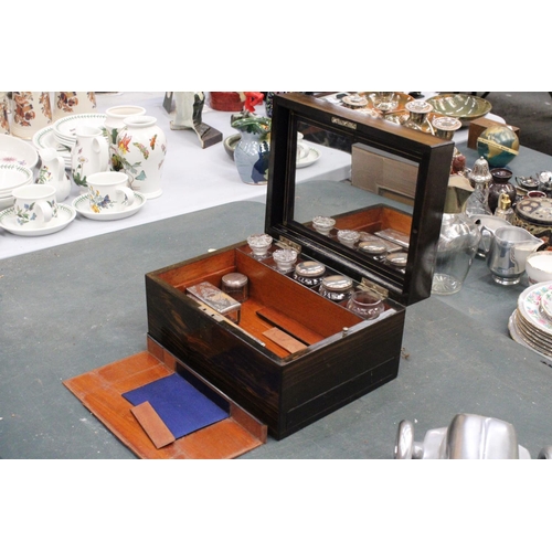 85 - A VINTAGE MAHOGANY CASED WRITING BOX WITH A SECRET DRAWER TO INCLUDE INKWELLS, AND SILVER PLATED LID... 