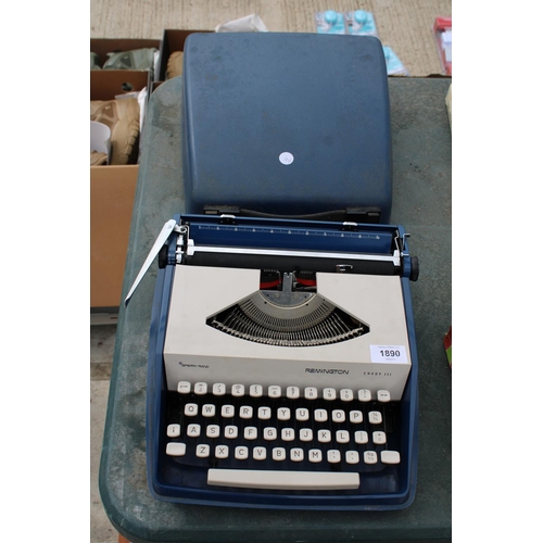 1890 - A REMINGTON ENVOY III TYPEWRITER WITH CARRY CASE