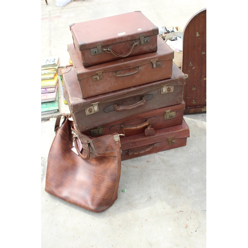 1904 - FIVE VINTAGE LEATHER TRAVEL CASES AND A LEATHER BAG