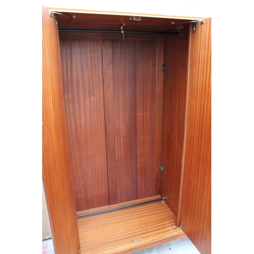 3084 - A MID 20TH CENTURY TEAK THREE DOOR WARDROBE, 55