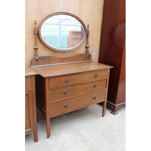 3085 - AN EARLY 20TH CENTURY OAK BEDROOM SUITE COMPRISING MIRROR DOOR WARDROBE, DRESSING CHEST AND CHEST