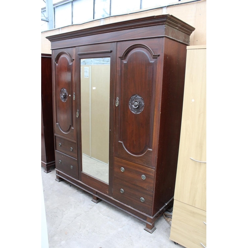 3087 - A LATE VICTORIAN MAHOGANY MIRROR DOOR WARDROBE WITH TWO CARVED DOORS, 74