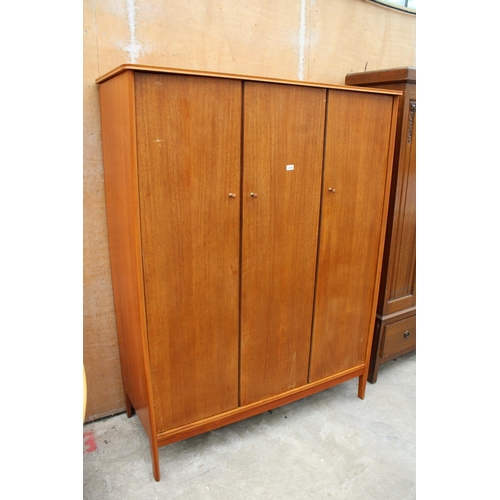 3084 - A MID 20TH CENTURY TEAK THREE DOOR WARDROBE, 55