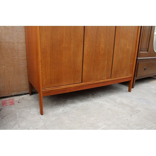 3084 - A MID 20TH CENTURY TEAK THREE DOOR WARDROBE, 55