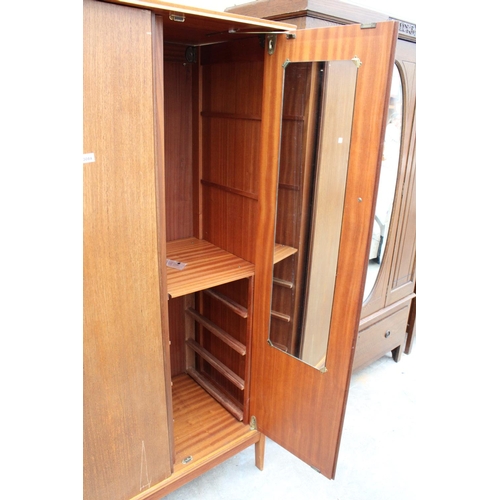 3084 - A MID 20TH CENTURY TEAK THREE DOOR WARDROBE, 55