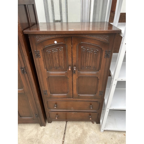 3111 - A REPRODUCTION OAK TALLBOY WITH LINENFOLD PANELS, 30