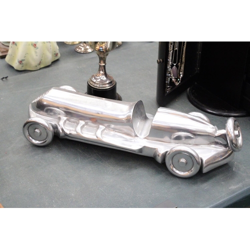 86 - A LARGE CHROME ART DECO RACING CAR, LENGTH APPROX 55CM