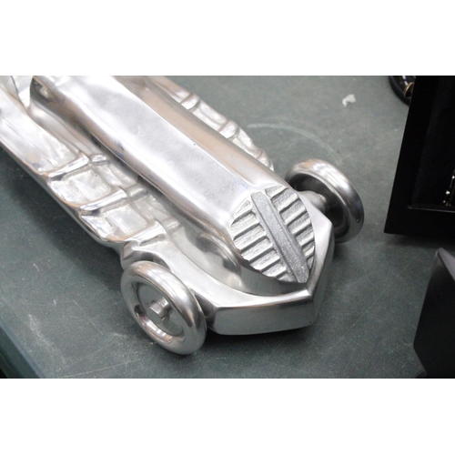 86 - A LARGE CHROME ART DECO RACING CAR, LENGTH APPROX 55CM