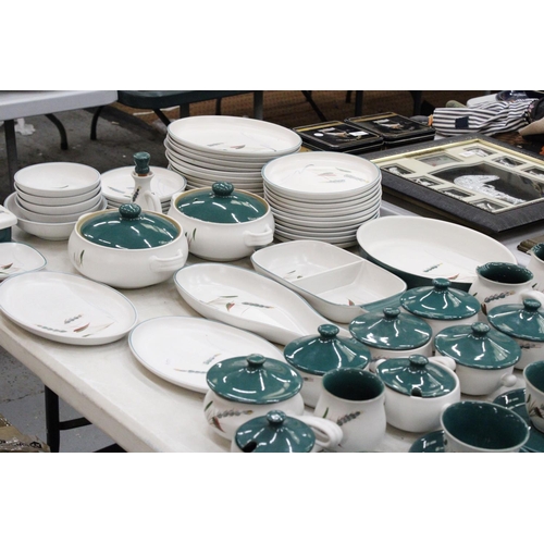 131 - A LARGE QUANTITY OF DENBY GREENWHEAT STONEWARE TO INCLUDE LIDDED SOUP COUPE'S, TEACUPS AND SAUCERS, ... 