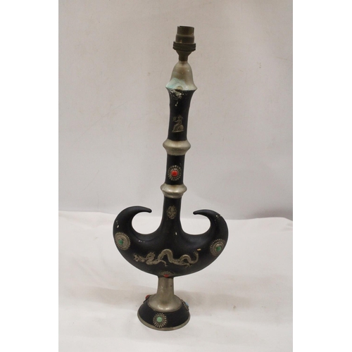 139 - AN ORIENTAL METAL FESTOONED DRAGON LAMP - 19 INCH (H)